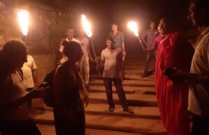 Tourists climb Mihintale with flaming torches